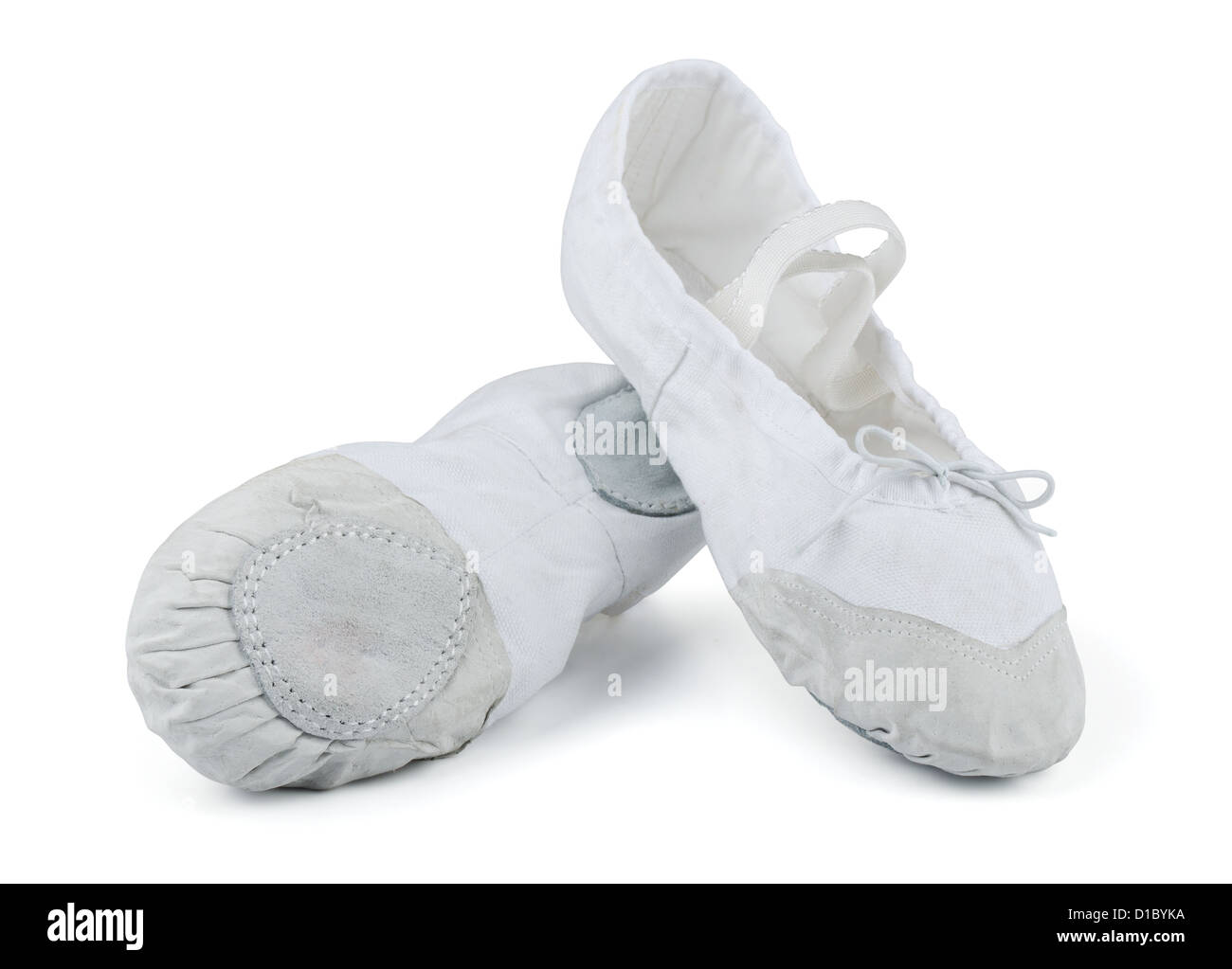 Pair of white ballet slippers isolated on white Stock Photo