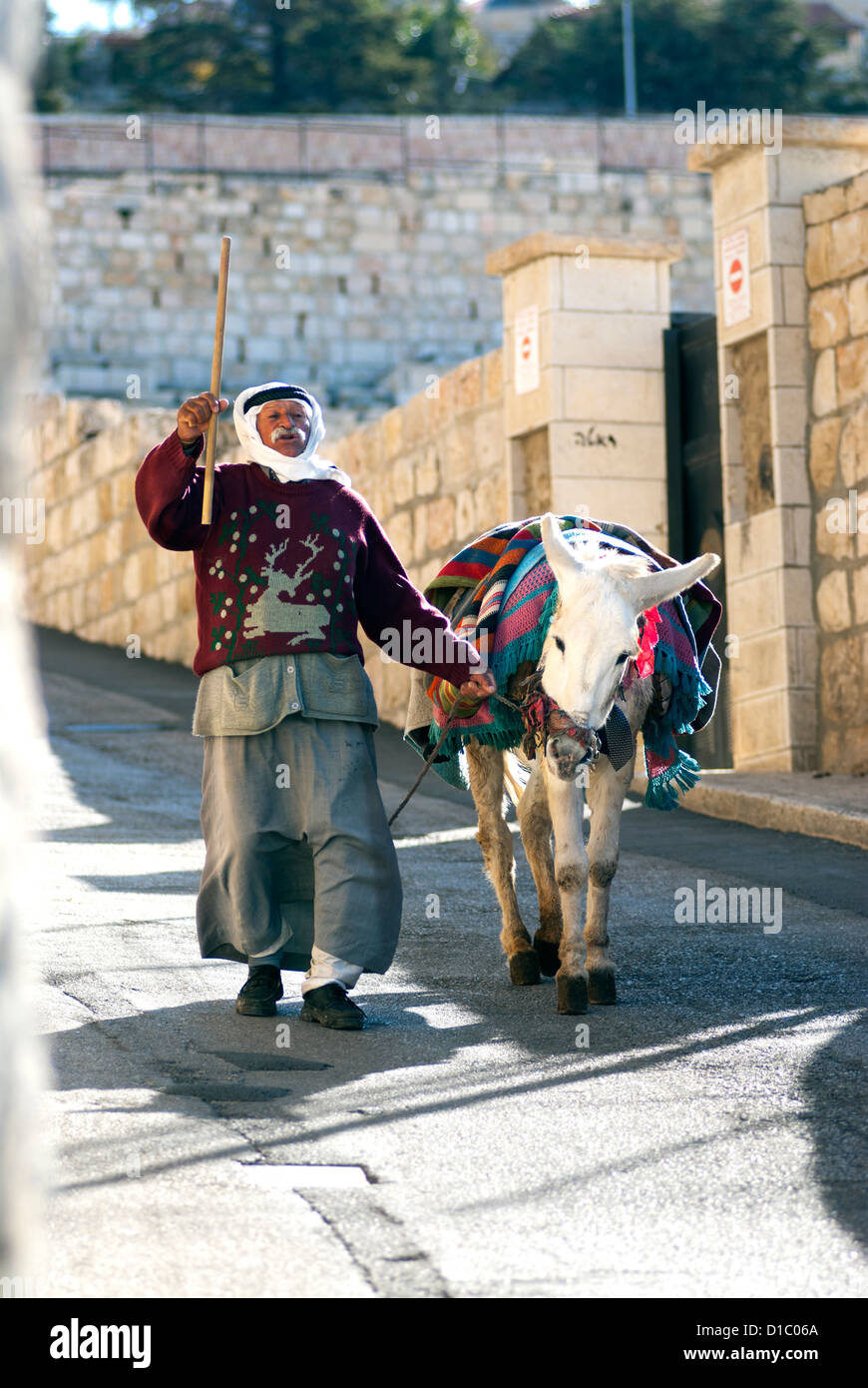 Muslim man rides donkey hi-res stock photography and images - Alamy