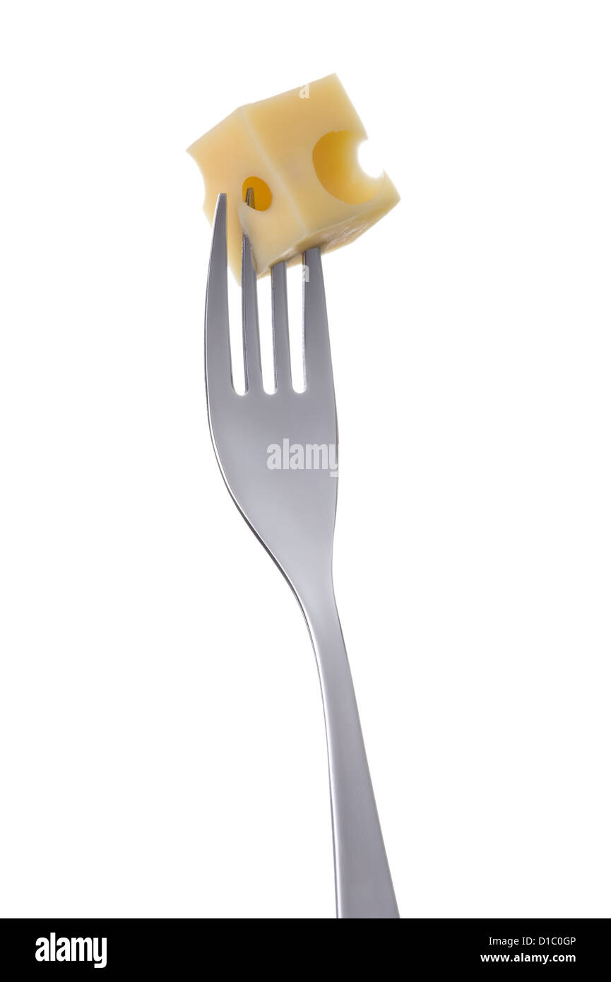 emmental cheese cube on a fork against white background Stock Photo
