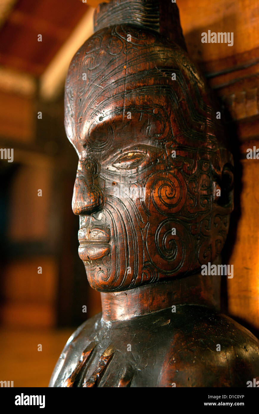 New Zealand. A tekoteko carving or man-like figure, represents a Maori tribe's common ancestor. Stock Photo