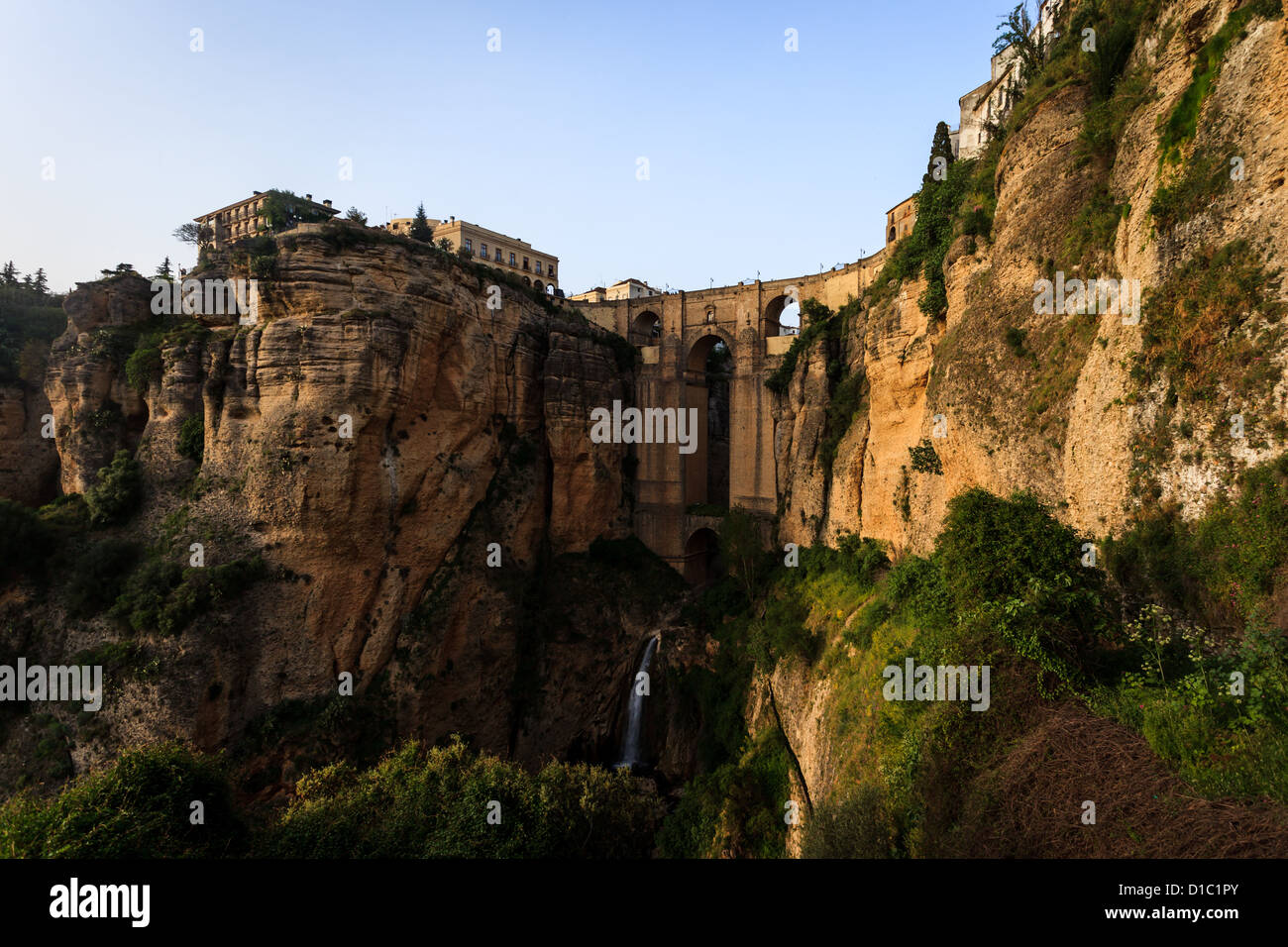 Both sides of Ronda, Spain connected by the ancient bridge spanning the Tajo Gorge Stock Photo