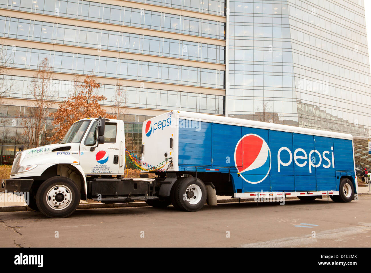 Pepsi Cola delivery truck in front of building Stock Photo