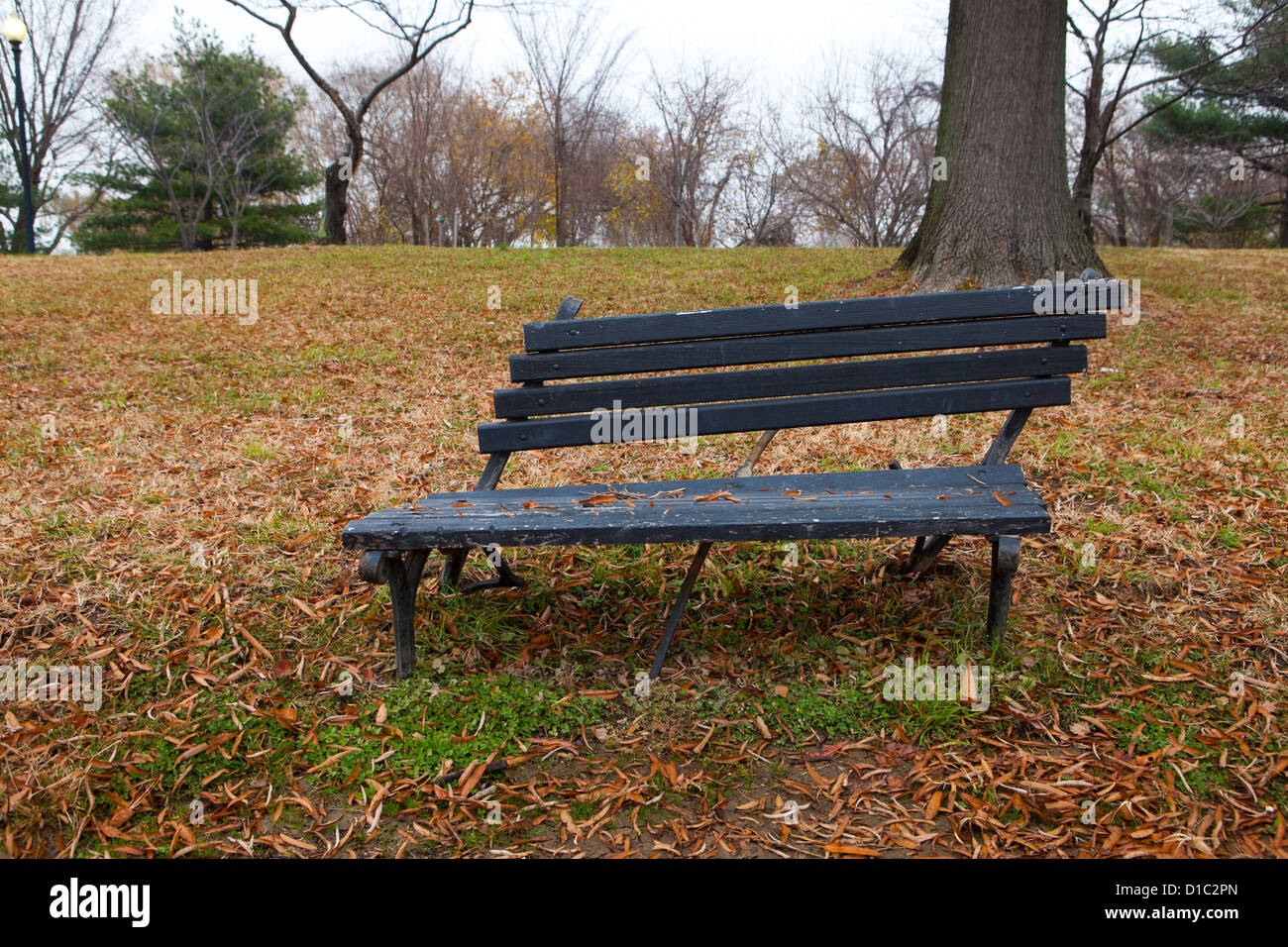 Broken park bench Stock Photo
