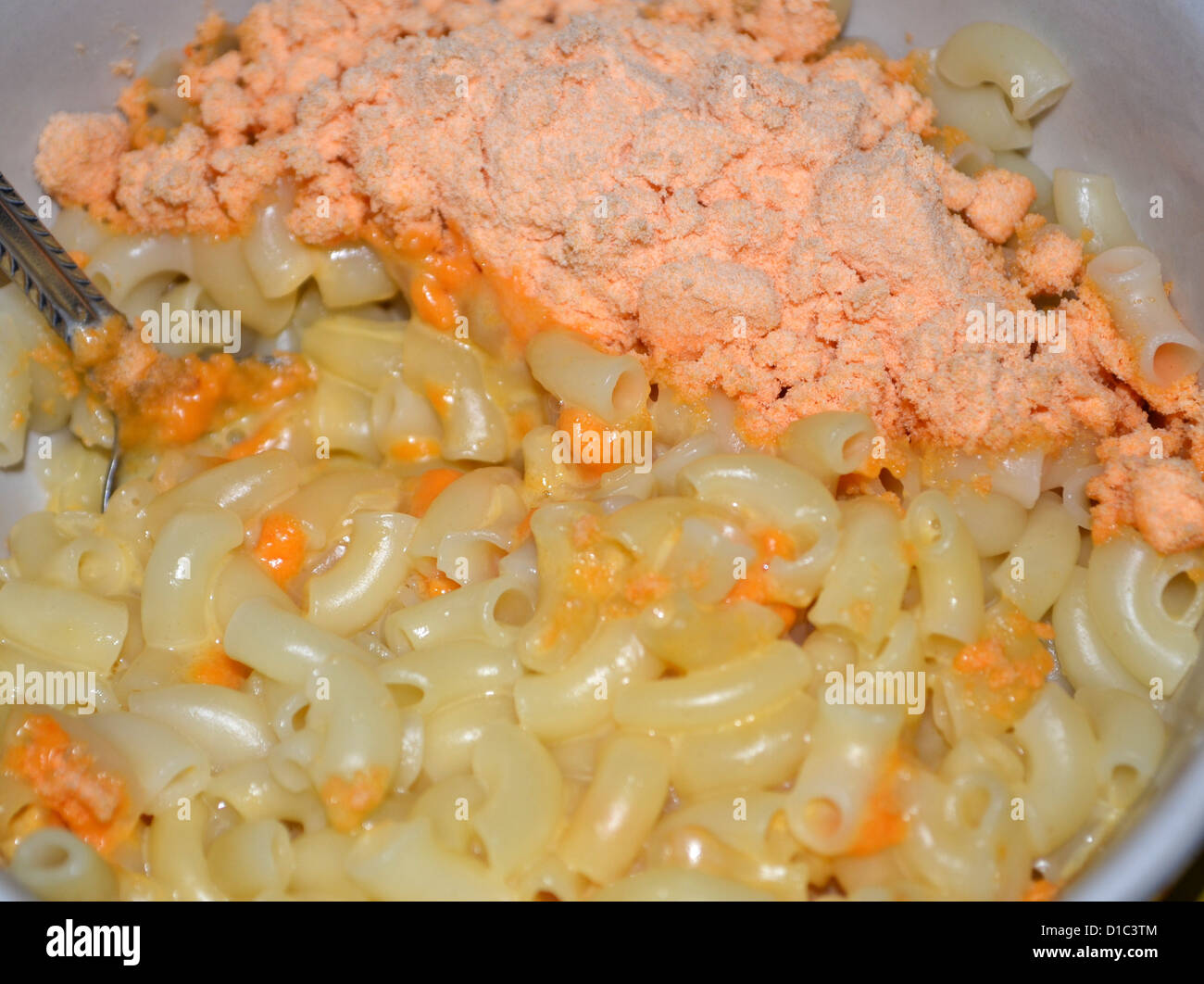 macaroni pasta with cheese powder unmixed mixing Stock Photo Alamy