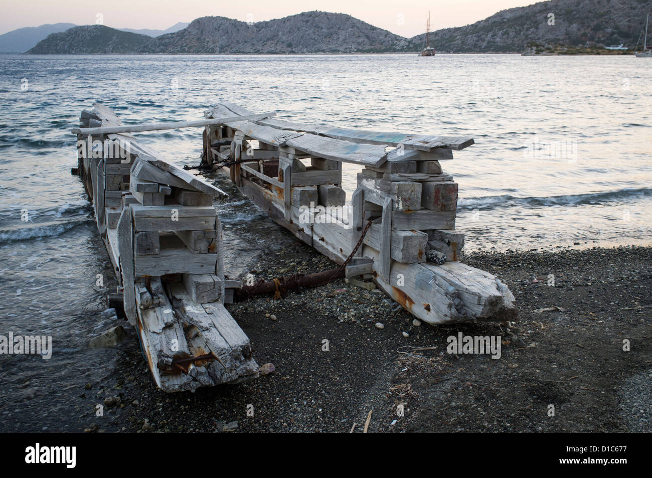 Wooden boat prop or support on beach Stock Photo Alamy