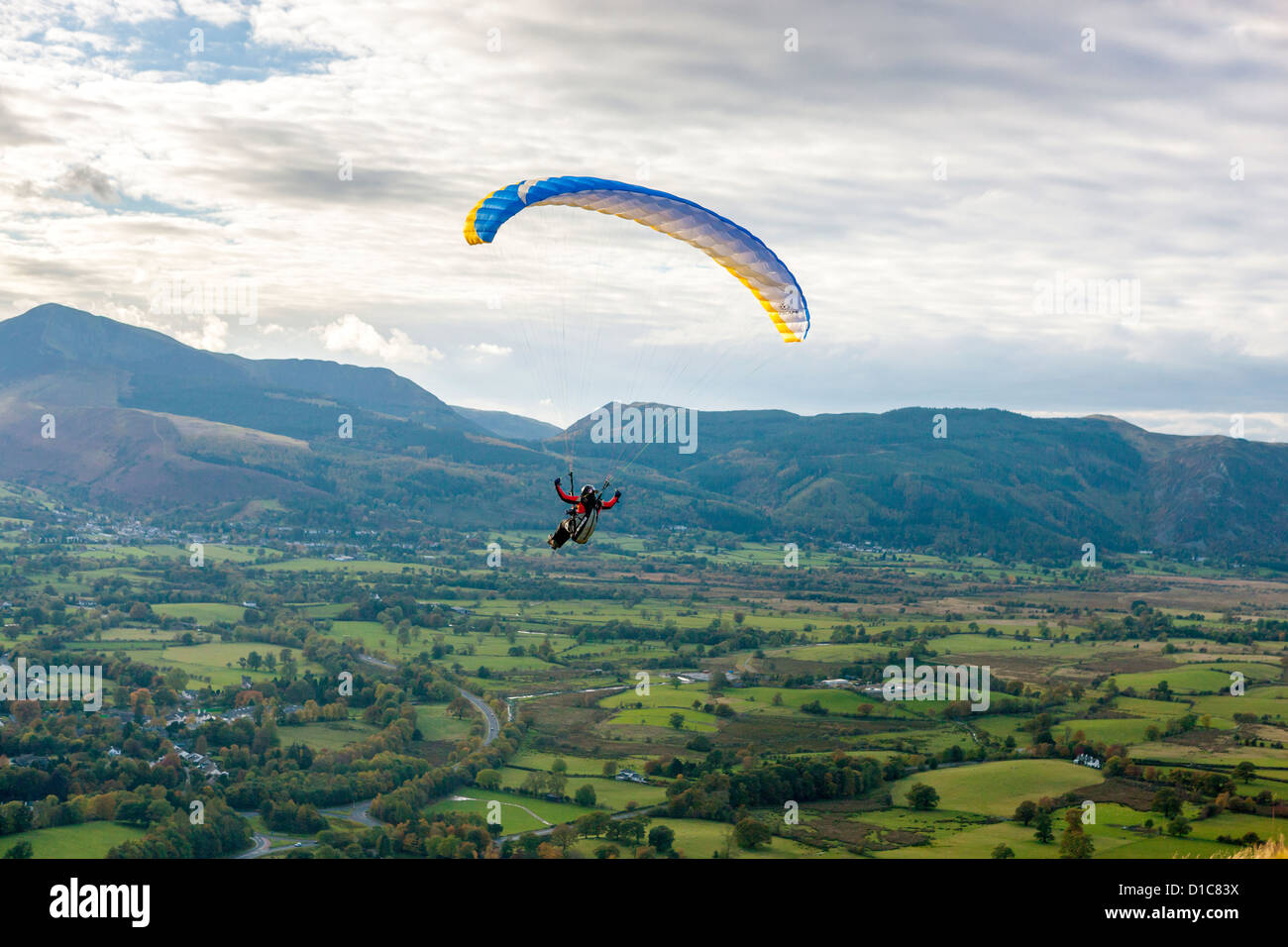 Paraglider over Keswick in the Lake District National Park. Stock Photo