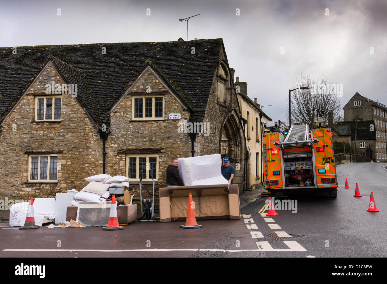 An image of the clear up operation in the aftermath of flooding which hit the Wiltshire town of Malmesbury on 25th November 2012. Stock Photo