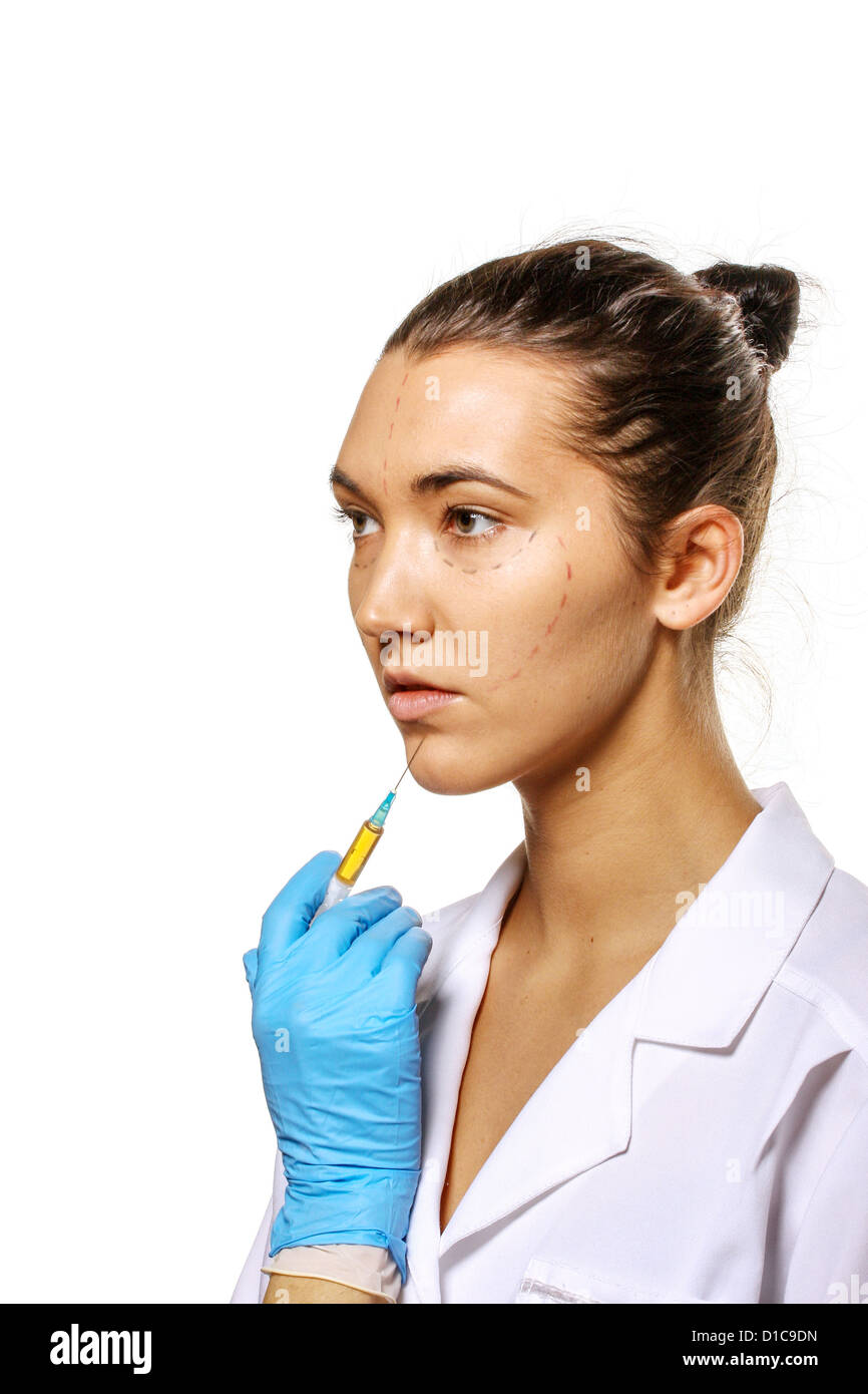 Survey before plastic surgery. Isolated on white Stock Photo Alamy