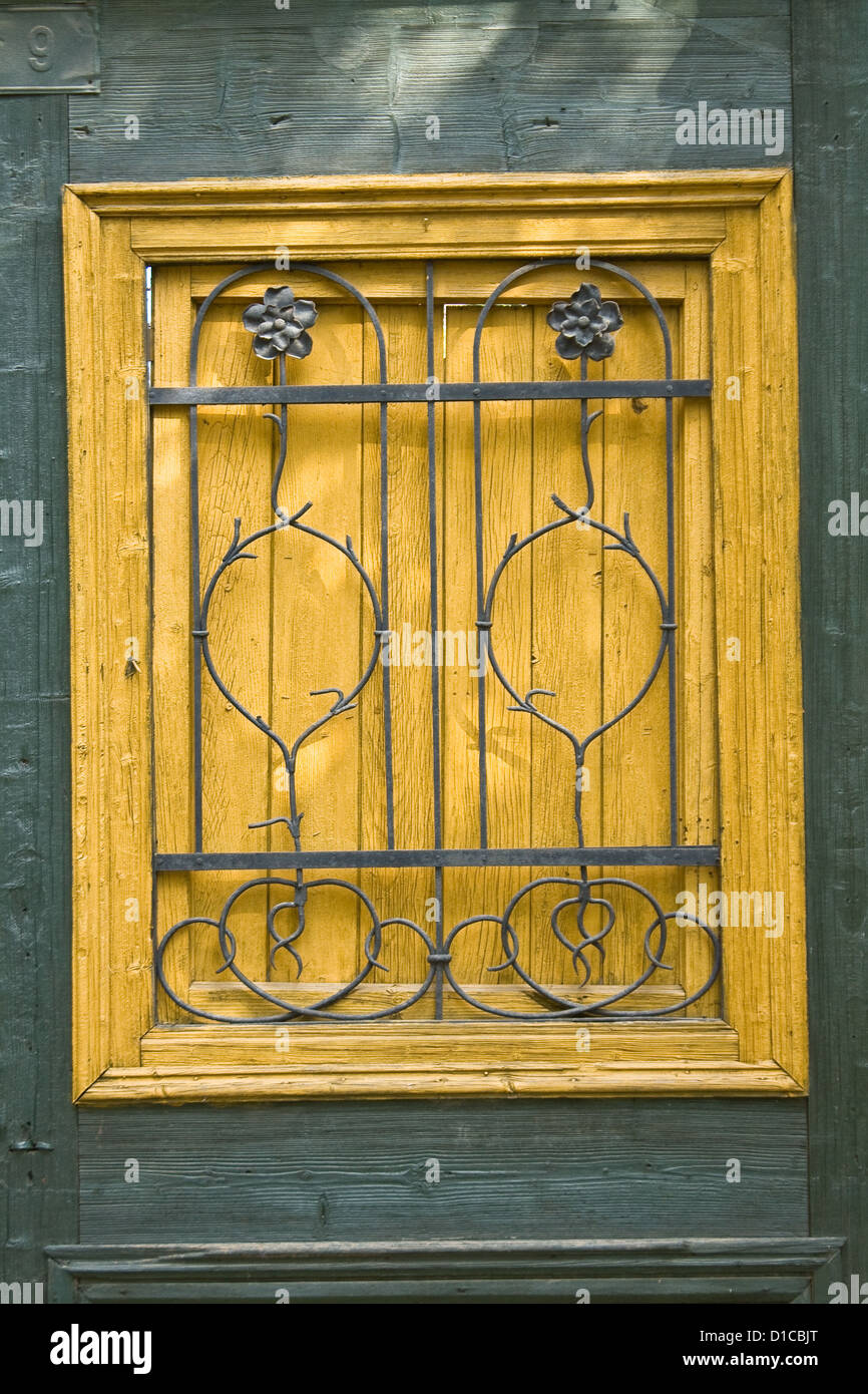 Old wooden door with metal ornaments Stock Photo