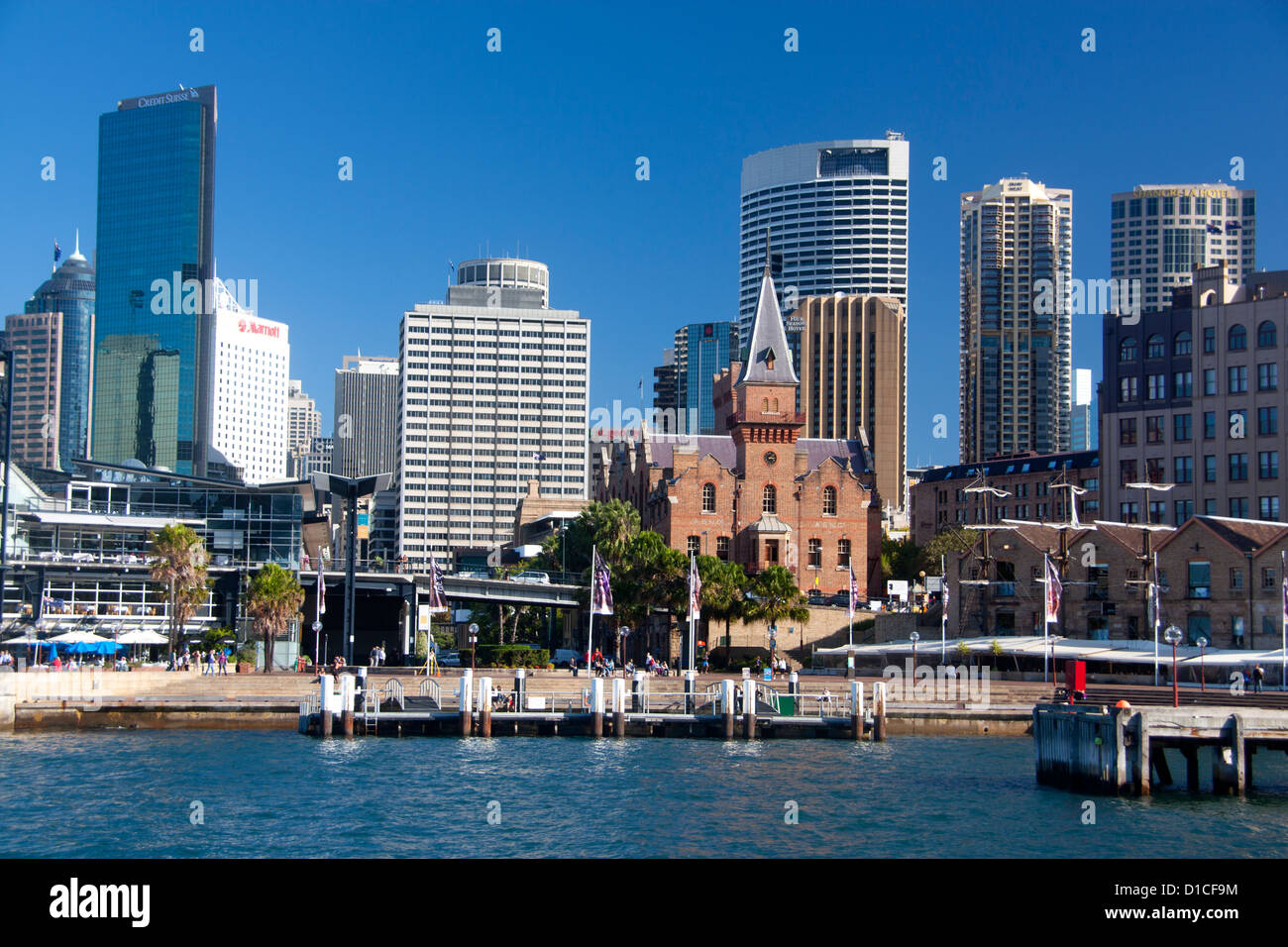 View across Campbells Cove to the Rocks with modern skyscraper skyline of CBD in background Sydney NSW Australia Stock Photo