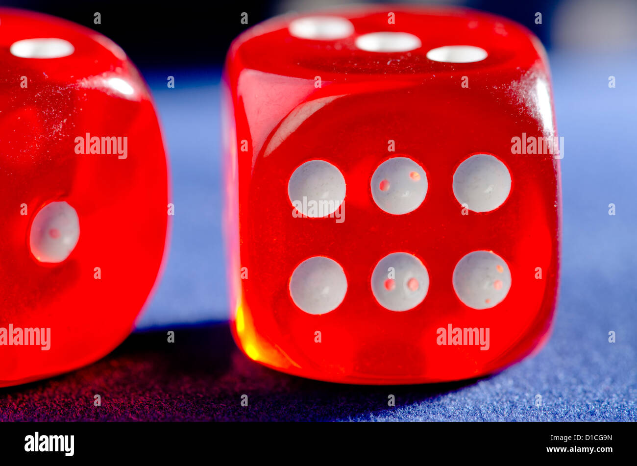 Rolling winning dice at casino Stock Photo - Alamy