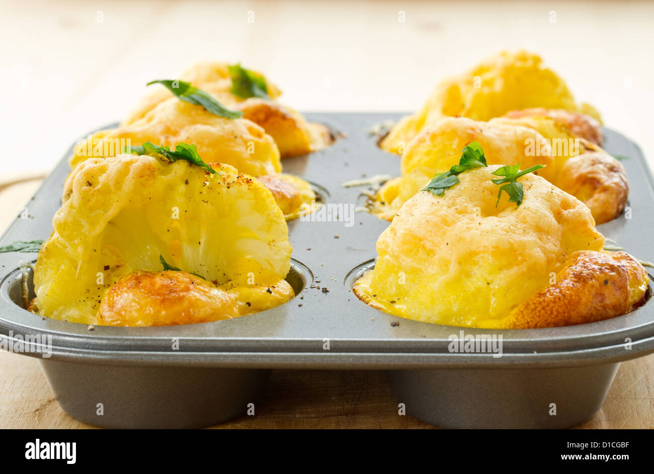 cauliflower baked in an egg and cheese Stock Photo Alamy