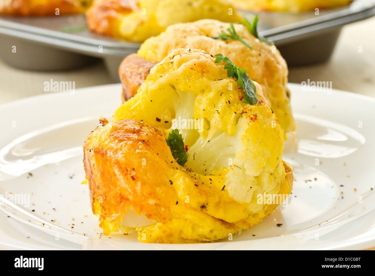 cauliflower baked in an egg and cheese Stock Photo Alamy