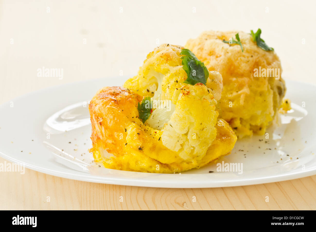 cauliflower baked in an egg and cheese Stock Photo Alamy
