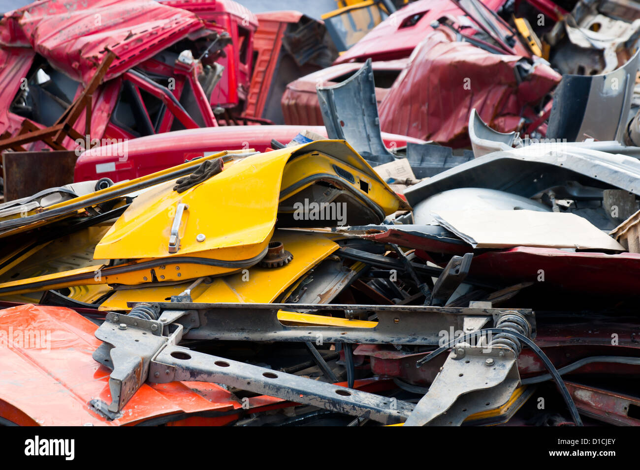 Stacks of crushed cars at junkyard Stock Photo