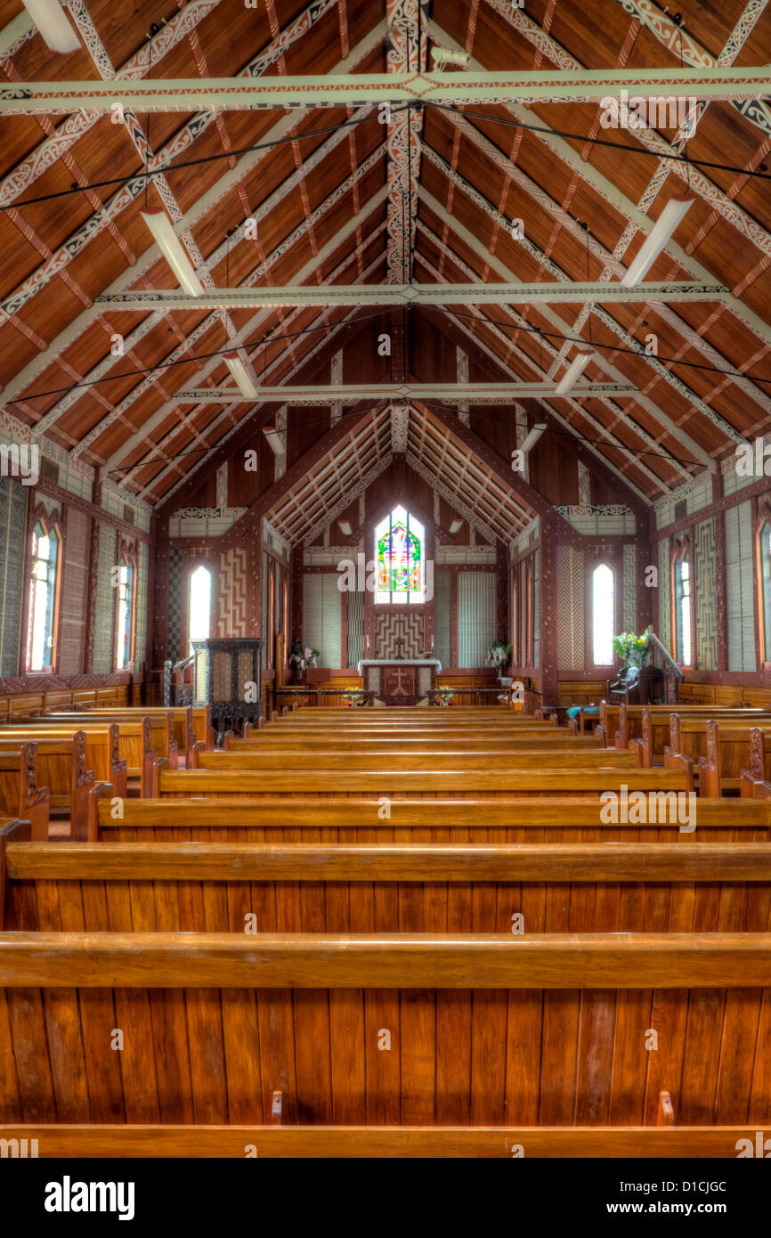 Cultural Syncretism. Decorated Ceiling and Rafter Supports with Maori Motifs, St. Mary's Anglican Church, Tikitiki, New Zealand. Stock Photo