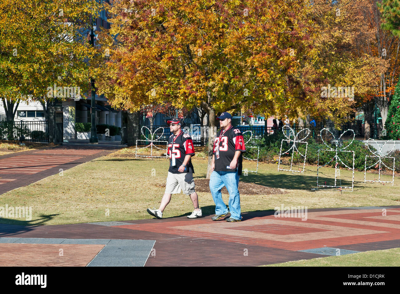 Football fans in Atlanta Falcons team Tshirts walking through