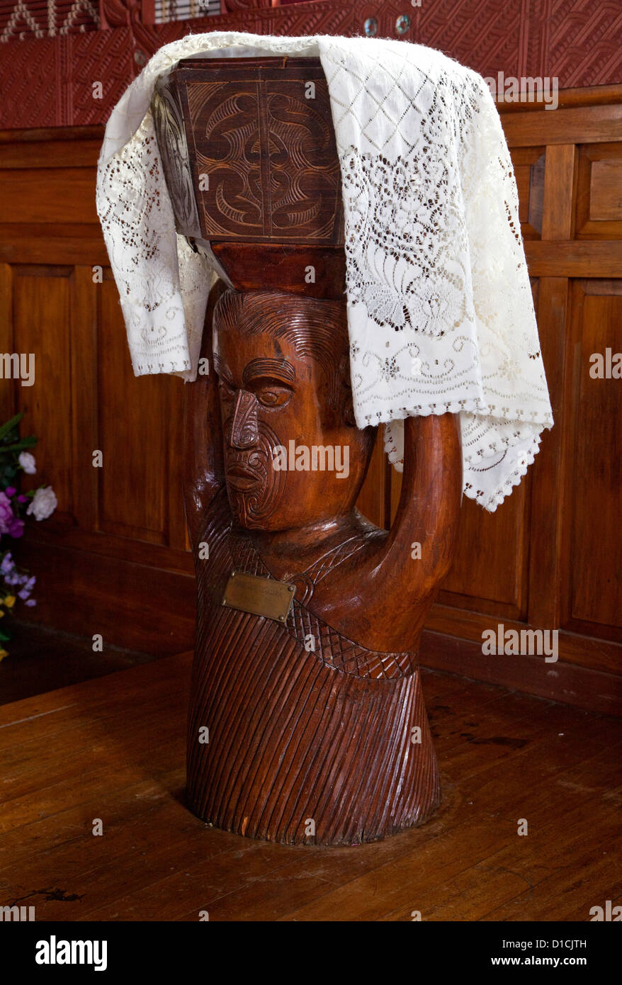 Baptismal Font, St. Mary's Anglican Church, Tikitiki, New Zealand.  Cultural Syncretism. Stock Photo