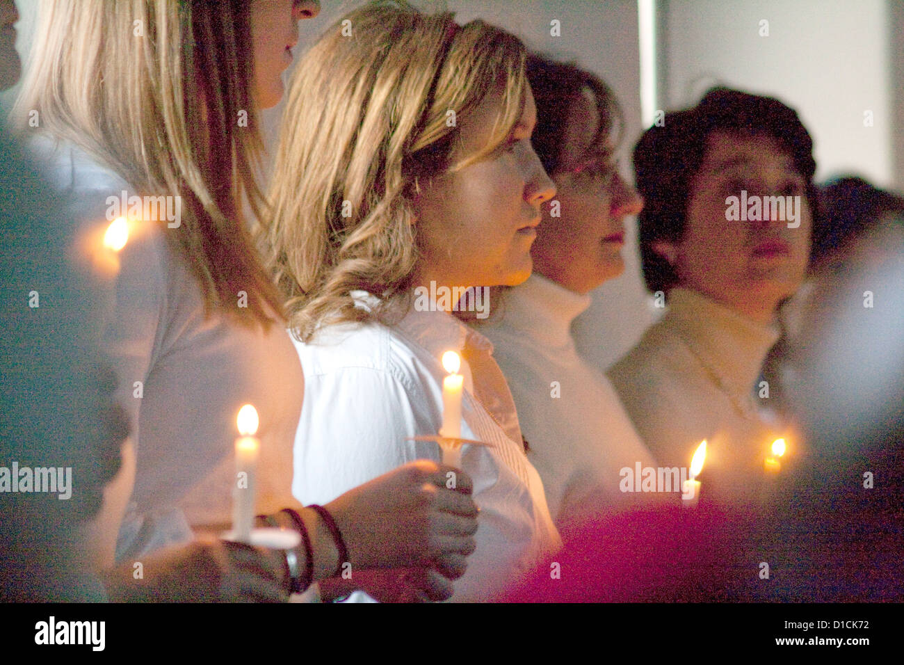 Acolytes holding candles after Christmas eve pageant service. Unity Church-Unitarian St Paul Minnesota MN USA Stock Photo