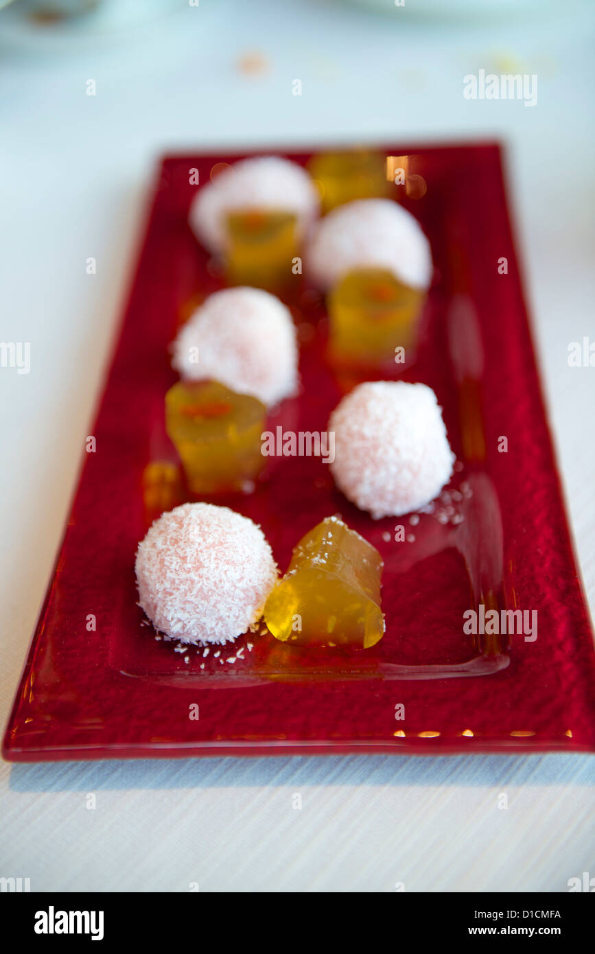 Chinese petit four dessets, jelly with red bean and coconut mollasses Stock Photo