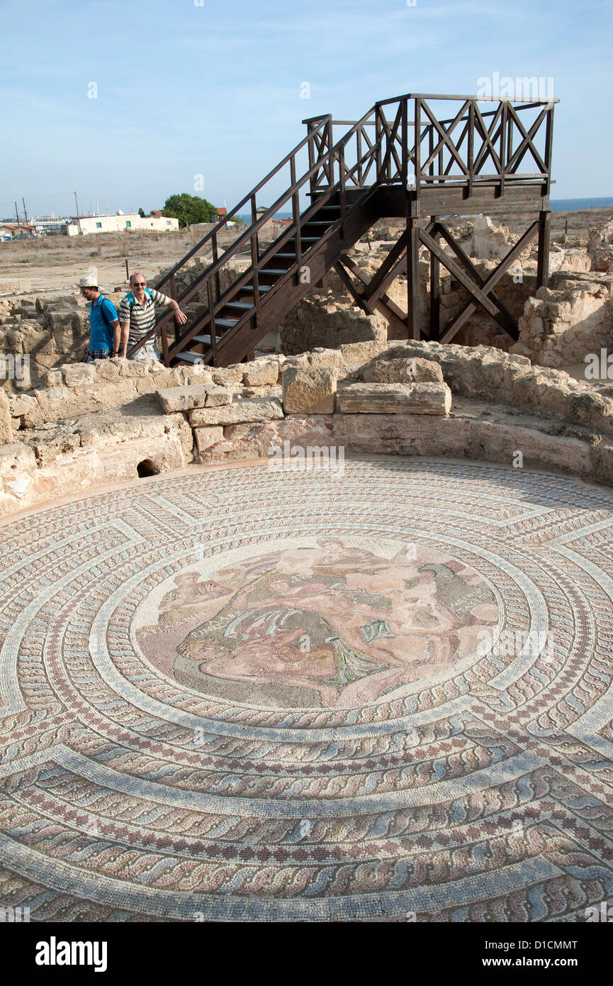 Paphos Mosaics Theseus and the Minotaur mosaic at Pafos Cyprus Tourists tour the historic site Stock Photo