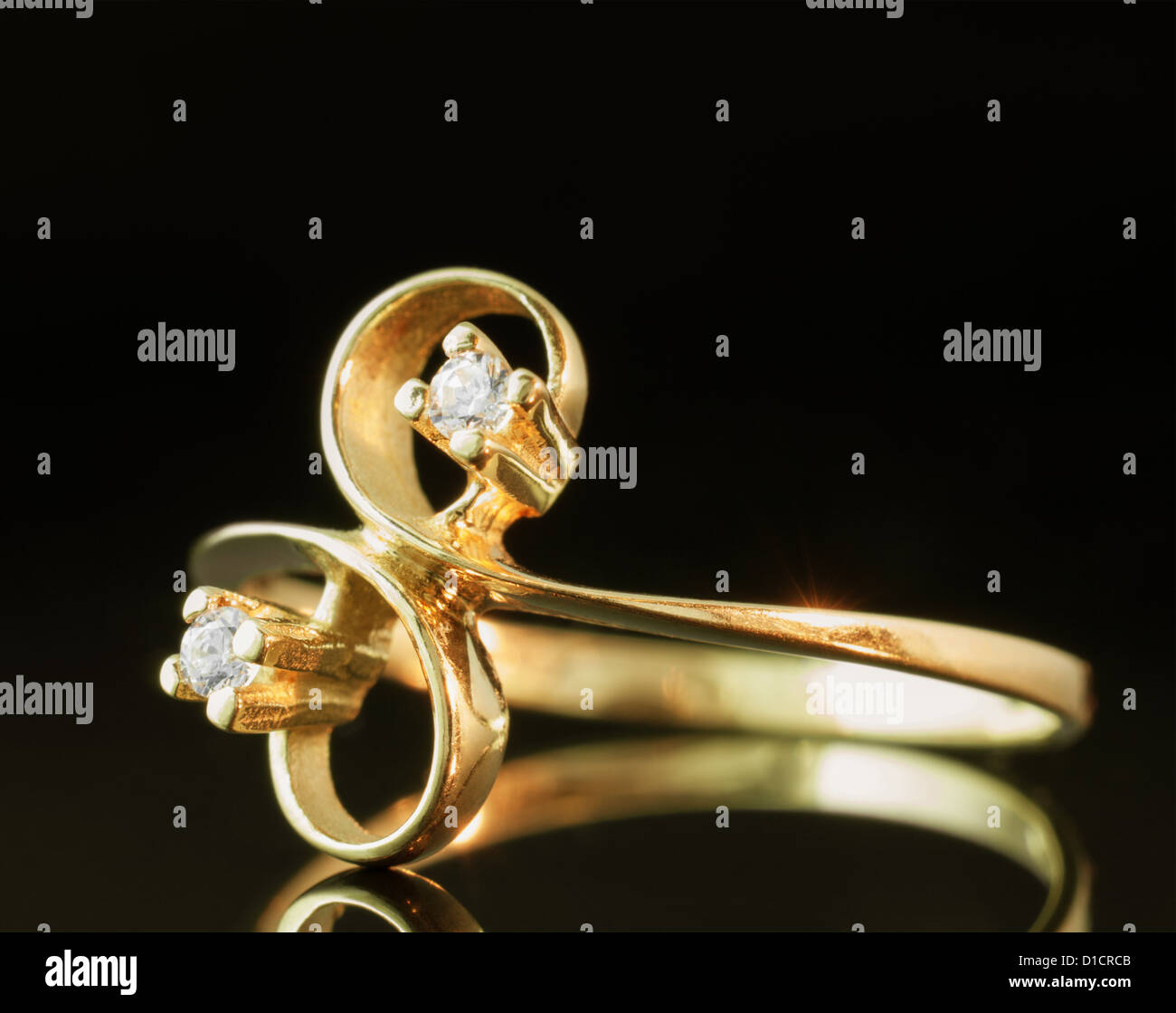 Gold ring on black background. Stock Photo