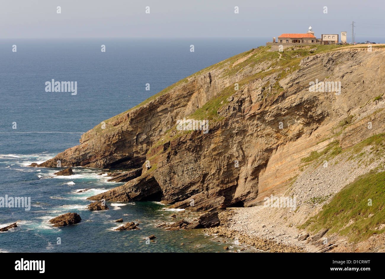 Ctiffsand lighthouse on the Asturian, Costa Verde,  coast between Puerto de Vega and Luarca. Navia, Asturias, Spain. Stock Photo