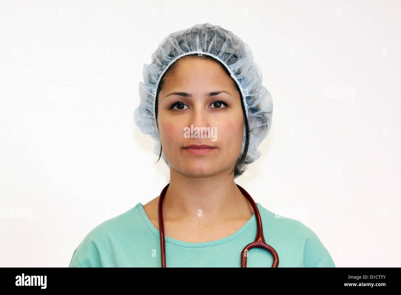 Berlin, Germany, young physican in tunic with surgical cap and stethoscope Stock Photo