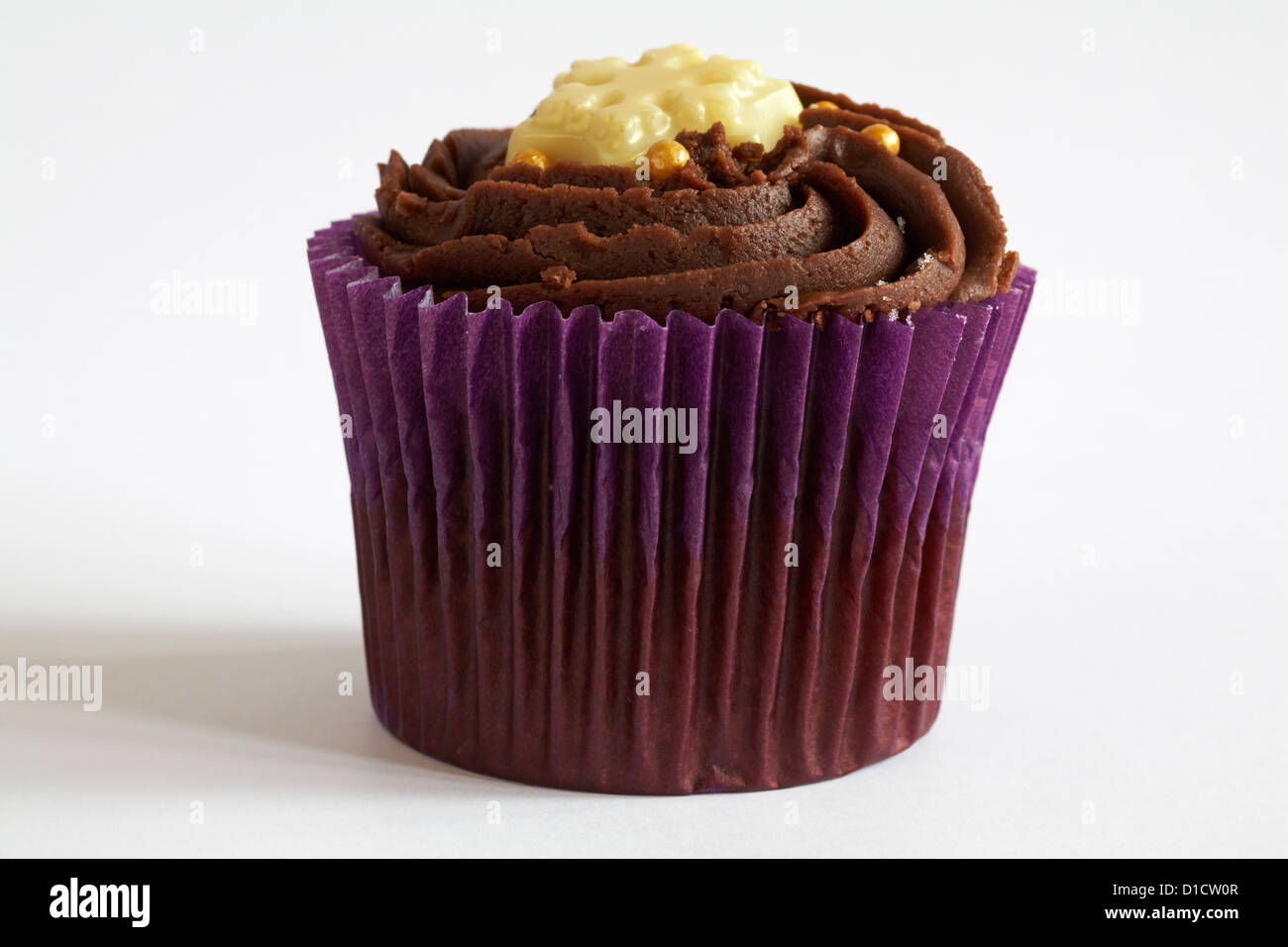 Snowflake chocolate cupcake isolated on white background Stock Photo