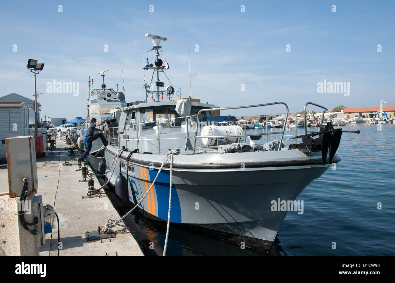 Marine police vessels Paphos Harbour Cyprus Officer boarding Stock Photo