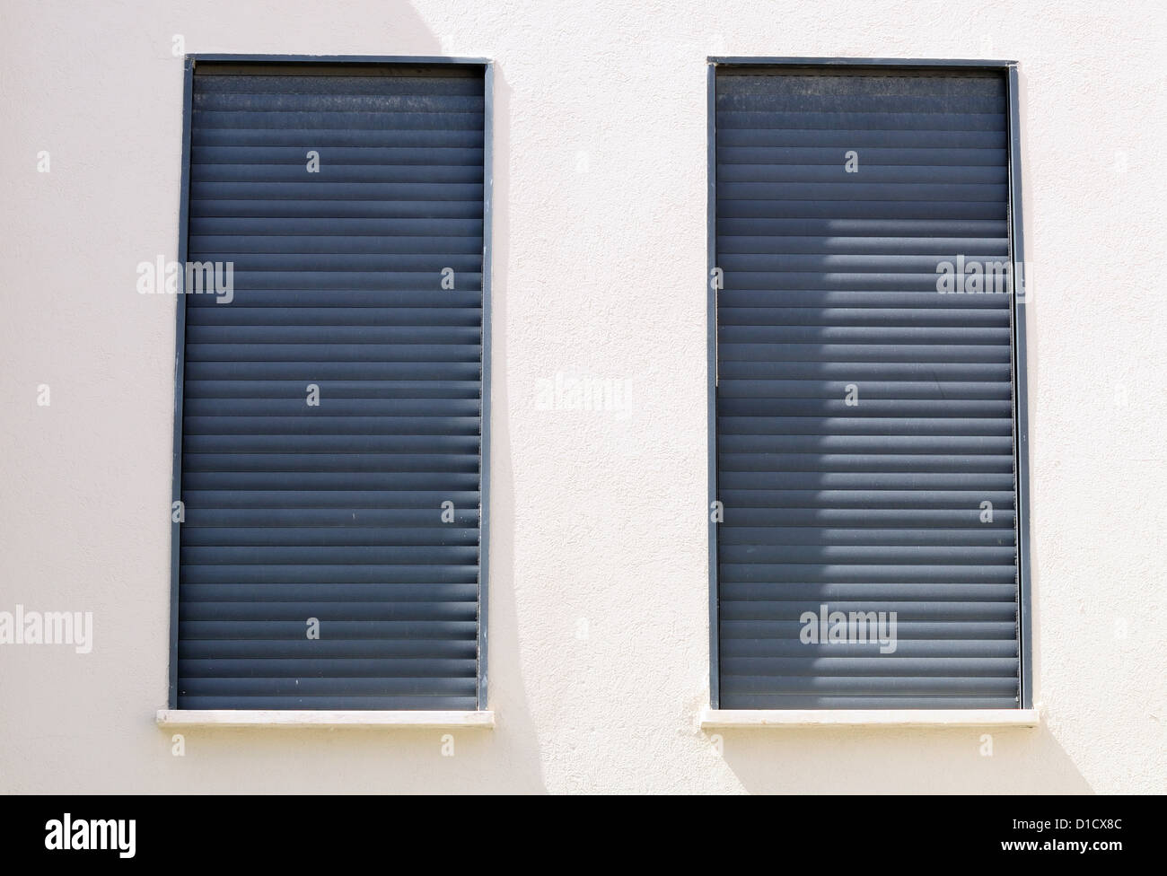 Window of a house closed with shutters Stock Photo Alamy