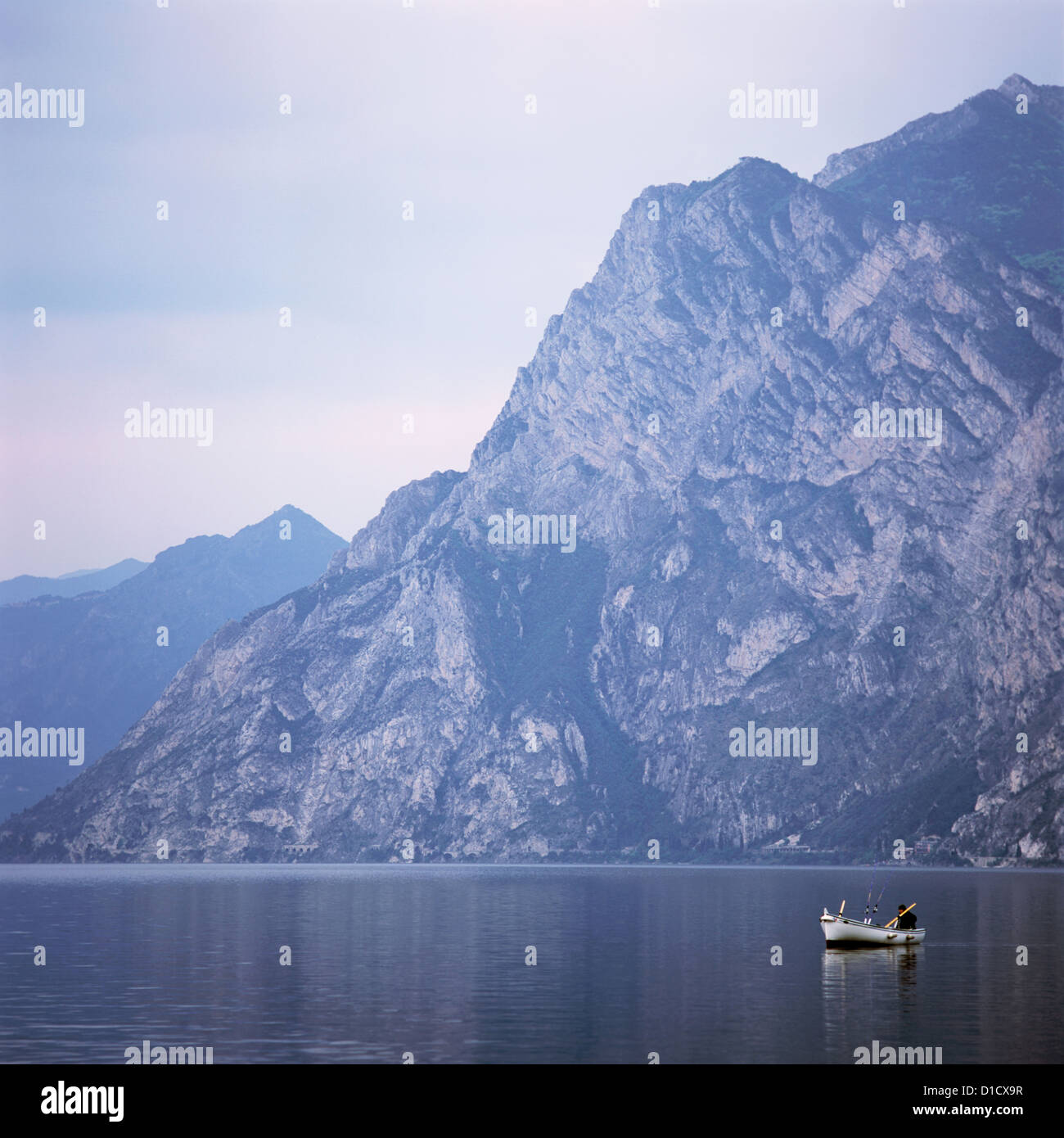 Torbole, Italy, rowing and fishing on Lake Garda Stock Photo - Alamy