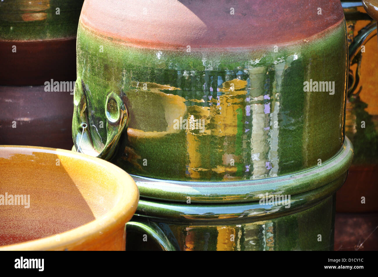 Brightly-coloured ceramic pots at a garden centre Stock Photo