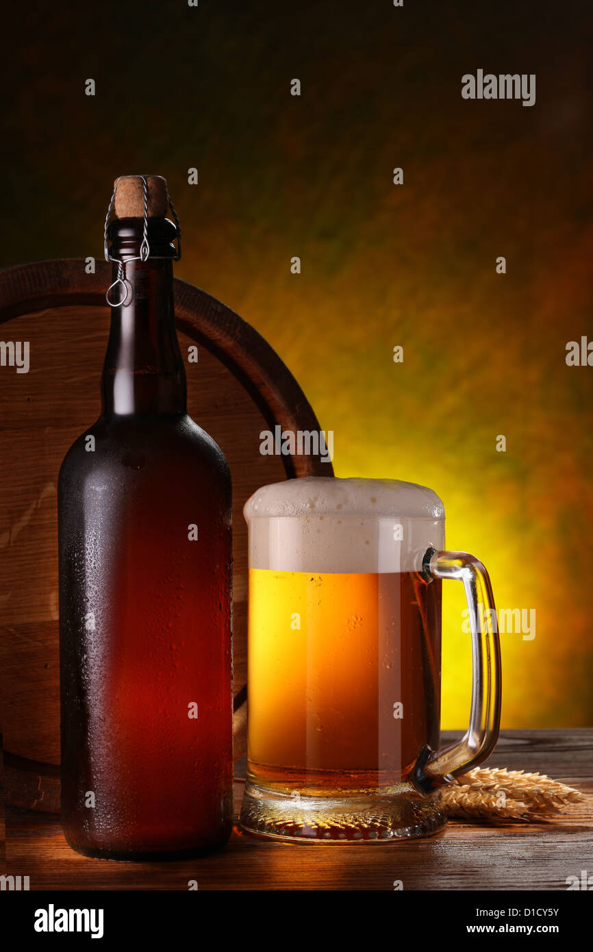 Still Life with a keg of beer and draft beer by the glass. Stock Photo