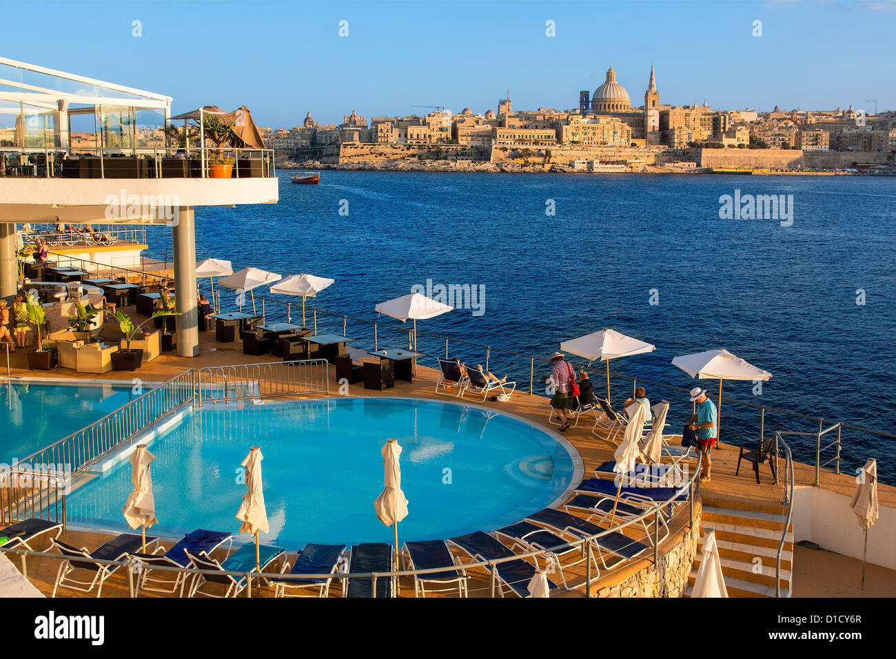 Valletta and dome of Carmelite Church from swimming pool in Sliema, Malta, Mediterranean, Europe Stock Photo