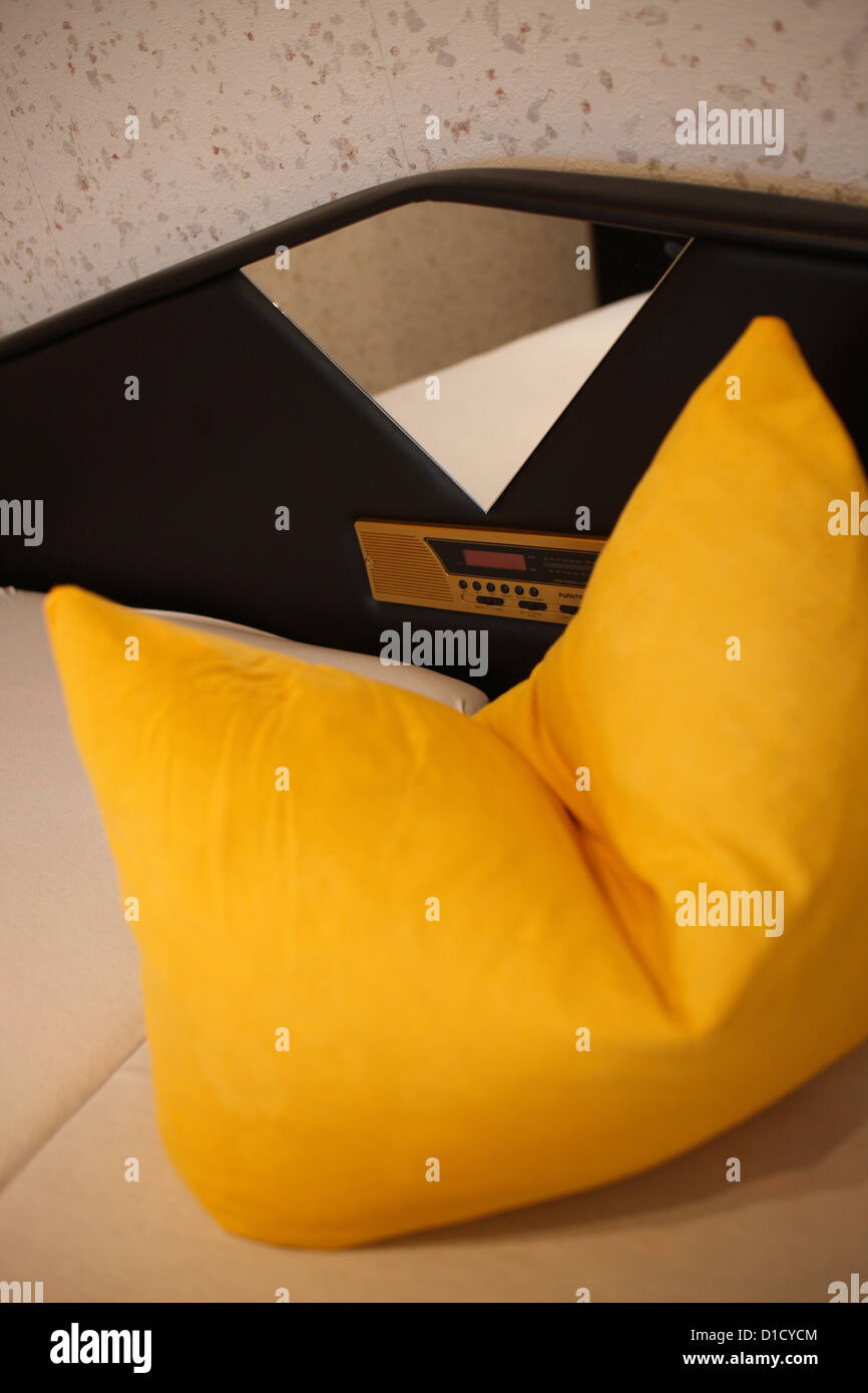Schalkau, Germany, yellow pillows on a bed with fold Stock Photo Alamy