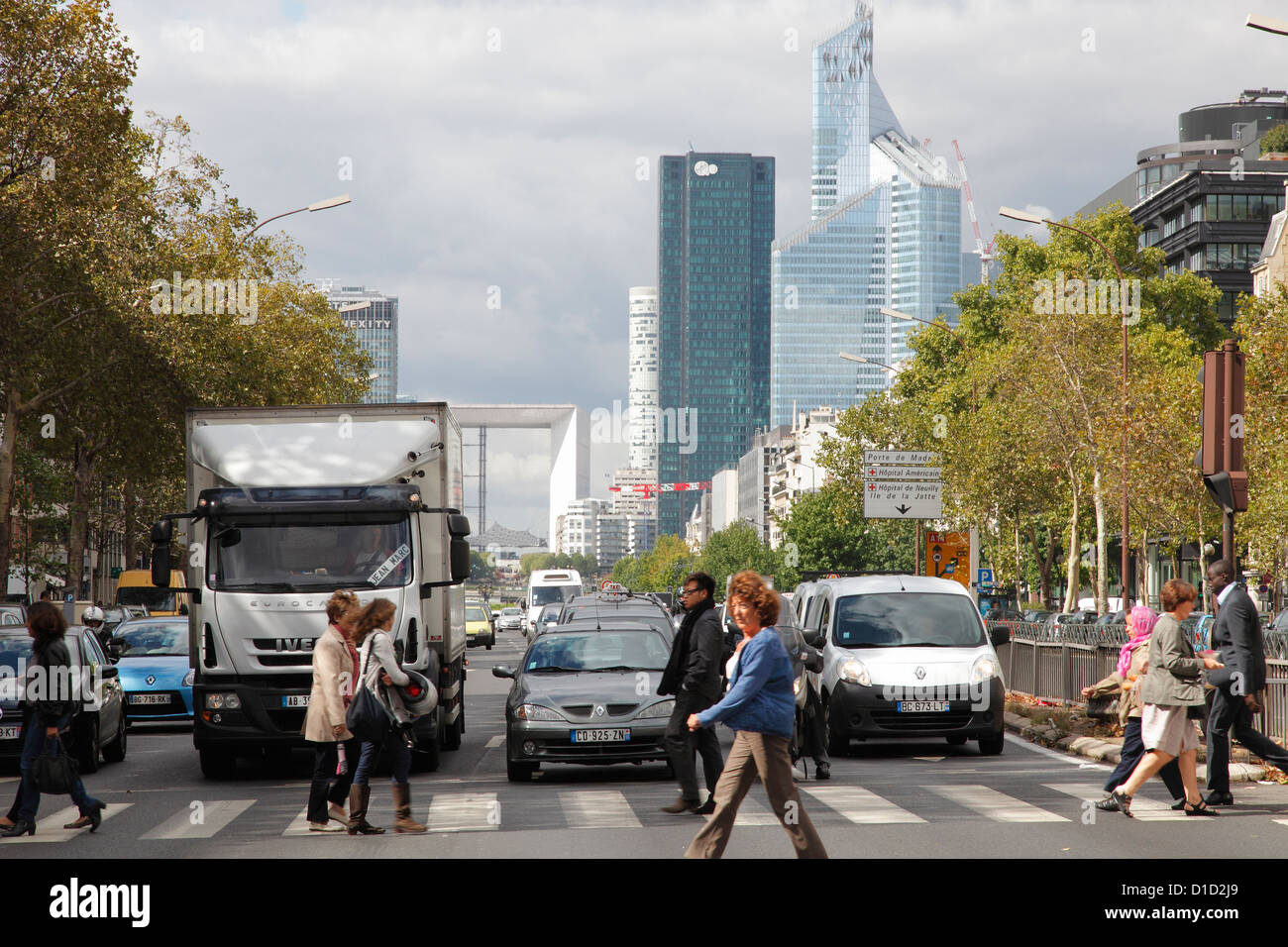 Avenue Charles de Gaulle in Neuilly sur Seine, Paris - In the background La Défense with Tour First and Tour RTE Stock Photo