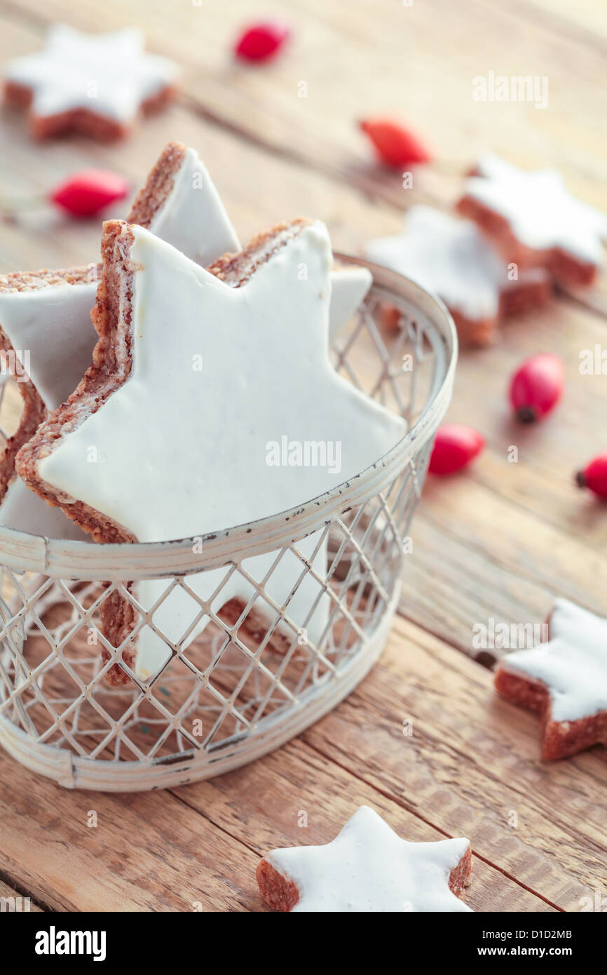 Christmas Cookies baked in star shapes with sugar icing. Stock Photo