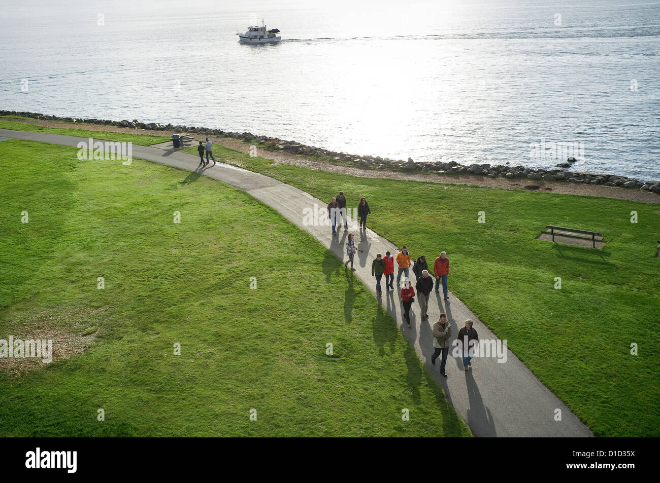 Family walking along Elliot Bay Trail, Myrtle Edwards Park Seattle