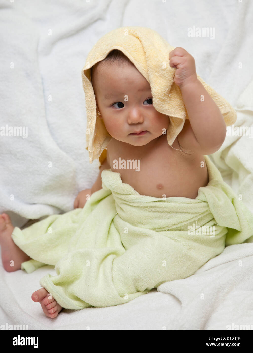 cute baby was wrapped by towels after bath Stock Photo Alamy