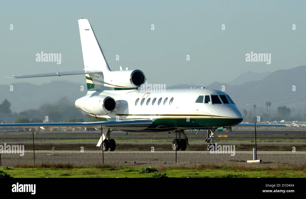 Dassault-breguet FALCON 50 taxing down the runway Stock Photo