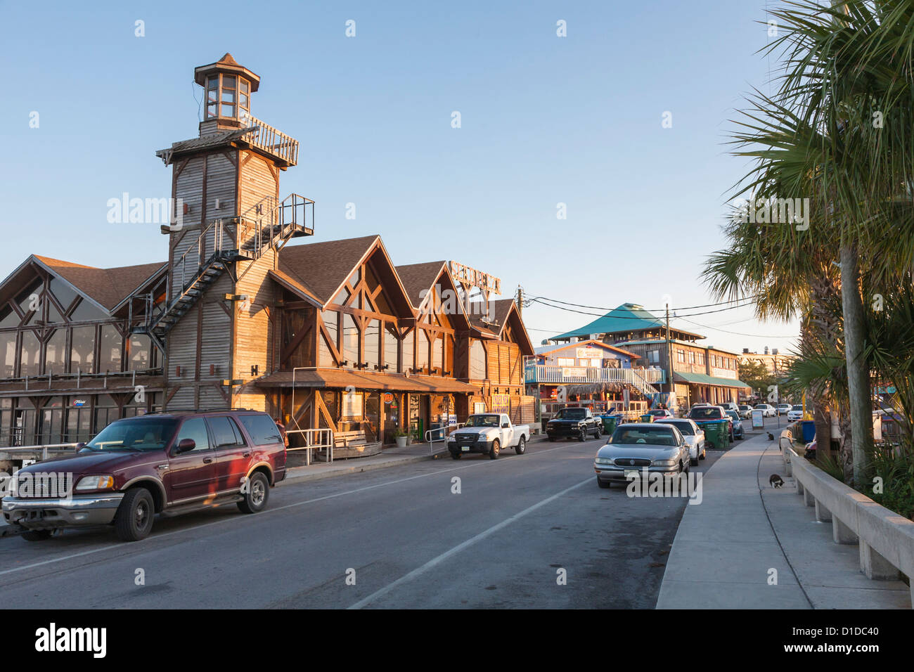 Seafood restaurants and souvenir shops line Dock Street on the