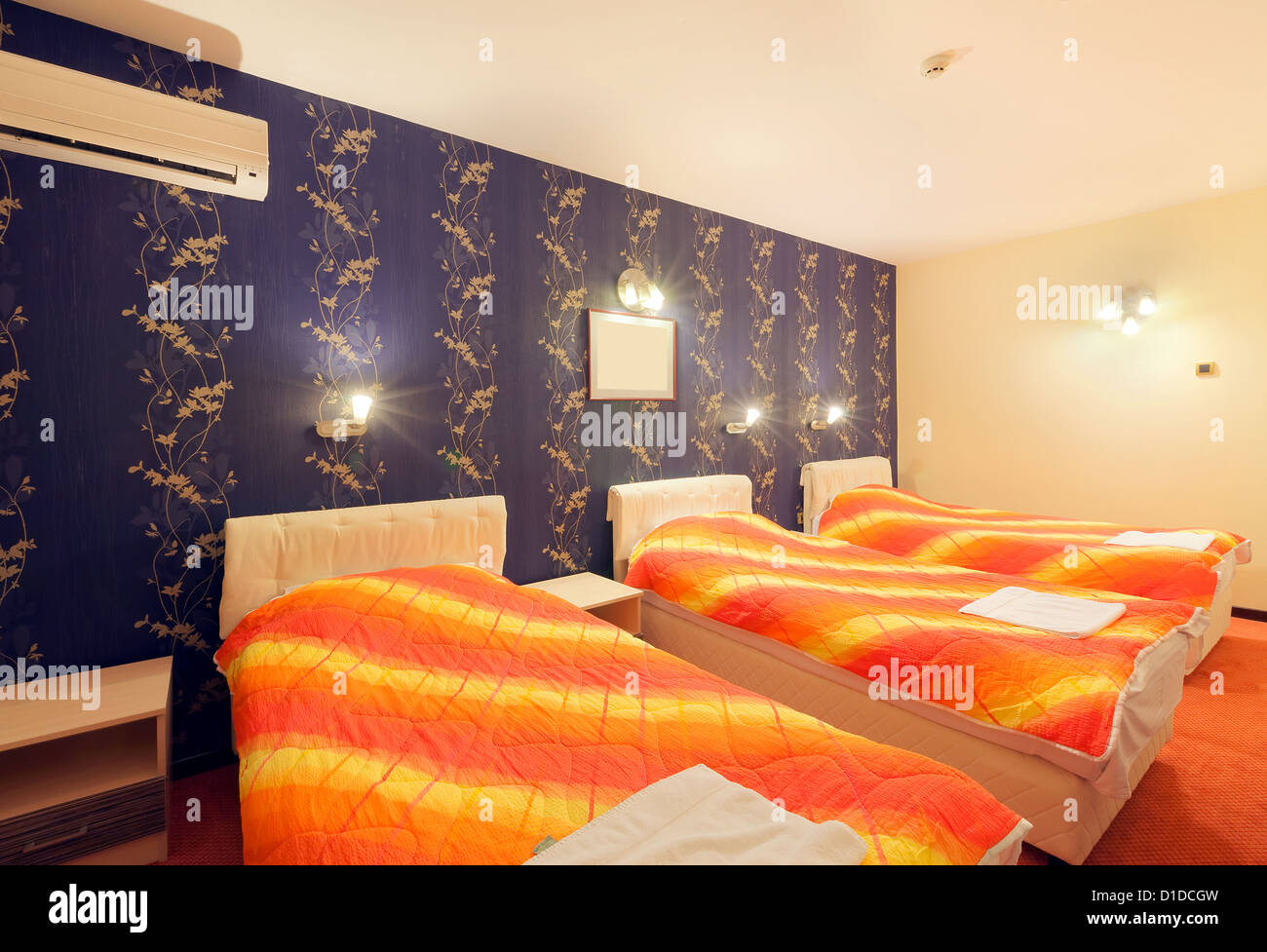 interior-of-a-hotel-room-for-three-persons-blue-wallpapers-and-orange