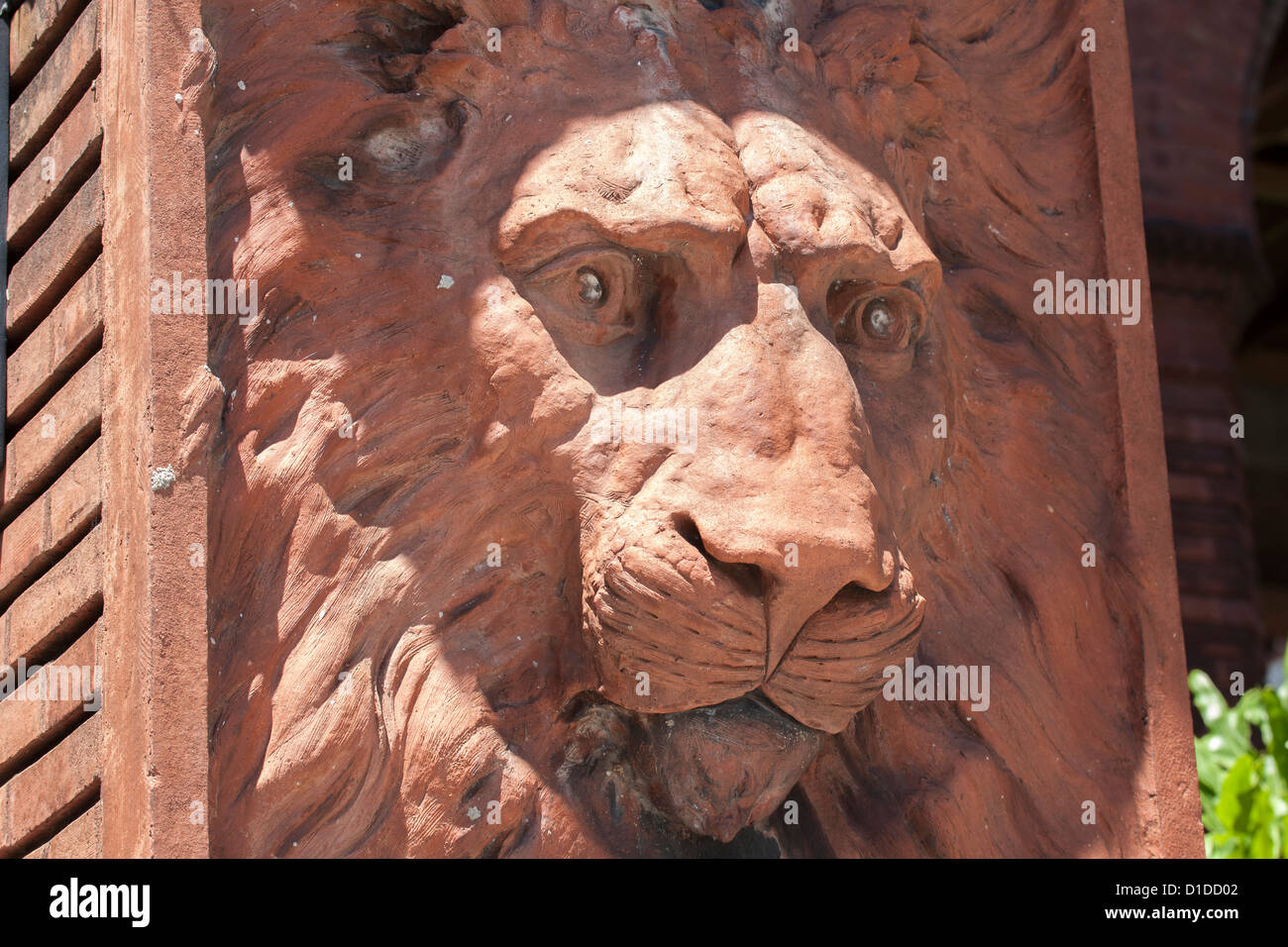 Stone sculpture of lion's face and mane in column at Flagler College in St. Augustine, Florida, USA Stock Photo