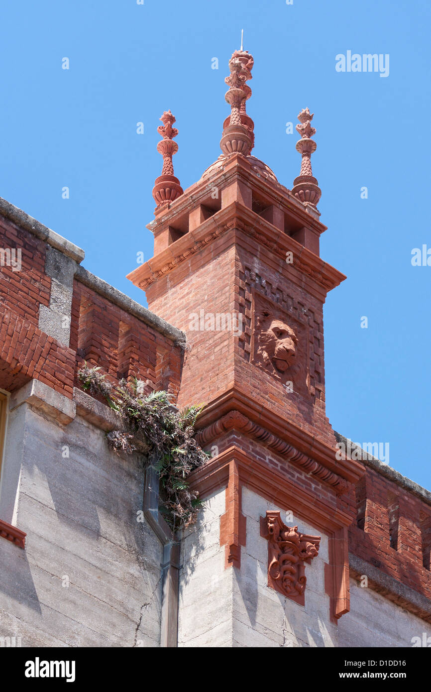 Tower with ornate terra cotta details along wall on building at Henry Flagler College in St. Augustine, Florida USA Stock Photo