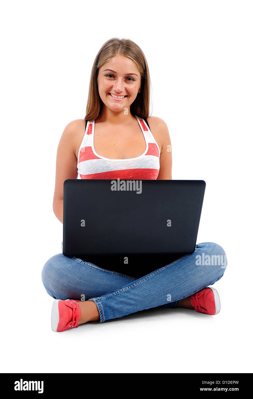 Isolated young casual woman using laptop Stock Photo - Alamy