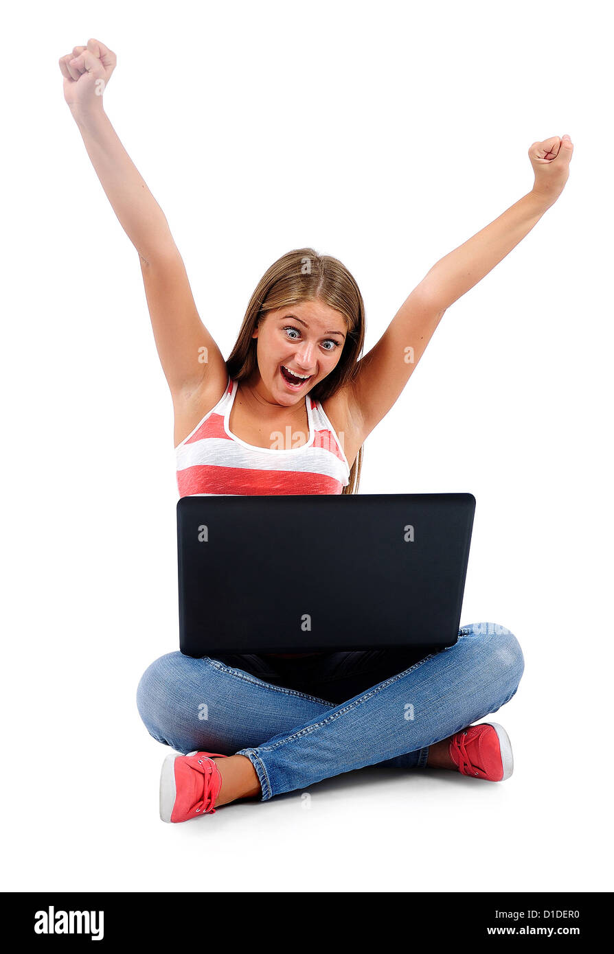 Isolated young casual woman using laptop Stock Photo - Alamy