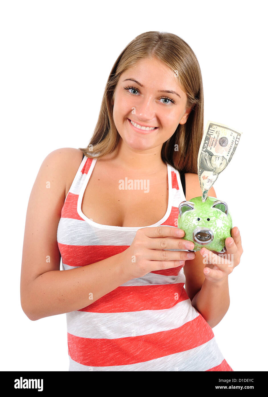 Isolated young casual woman with piggybank Stock Photo