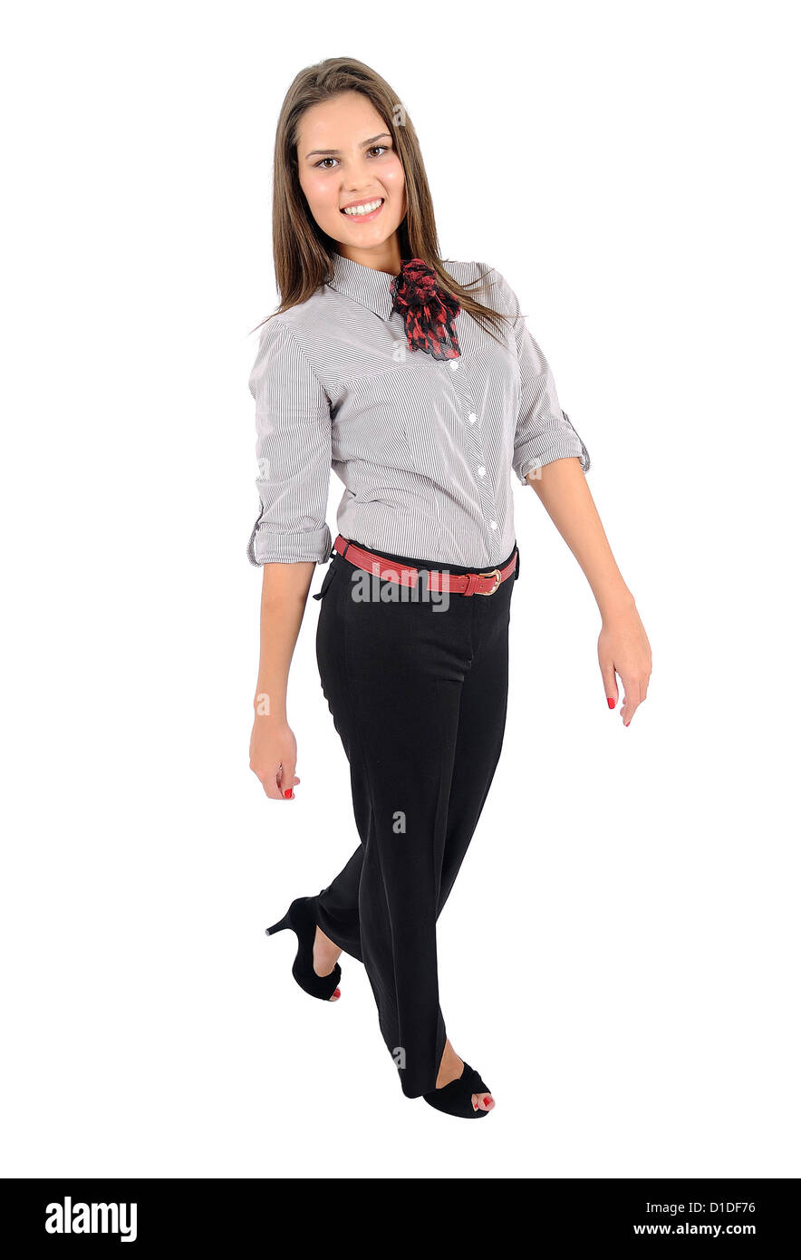 Isolated young business woman walking Stock Photo - Alamy
