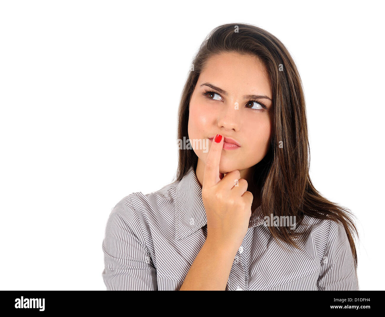 Isolated young business woman thinking Stock Photo - Alamy